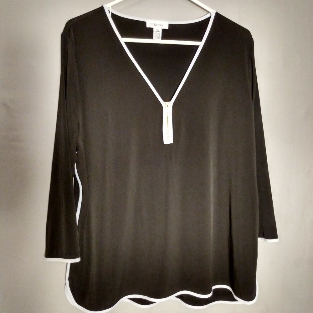 CALVIN KLIEN-XL black with white trim.  Gold zip up front neckline.